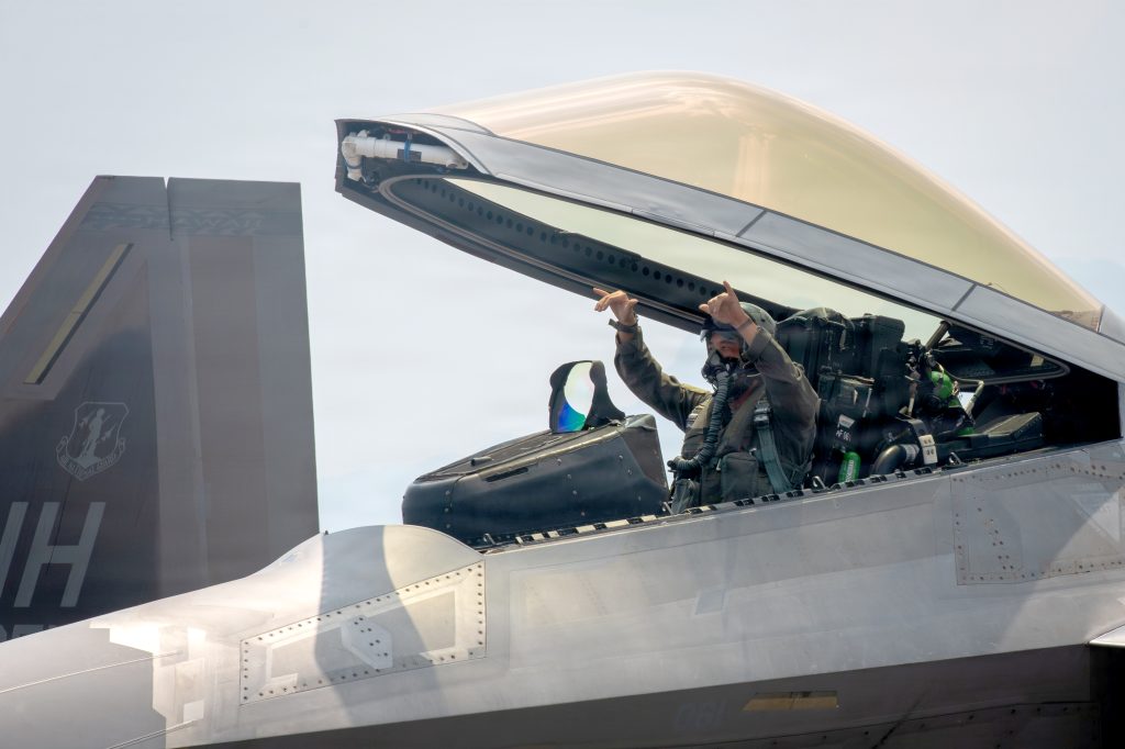 U.S. Air Force F-22 Raptor pilot, assigned to the 199th Air Expeditionary Squadron, flashed double shakas during the exercise. (U.S. Air National Guard photos by Senior Master Sgt. Mysti Bicoy)