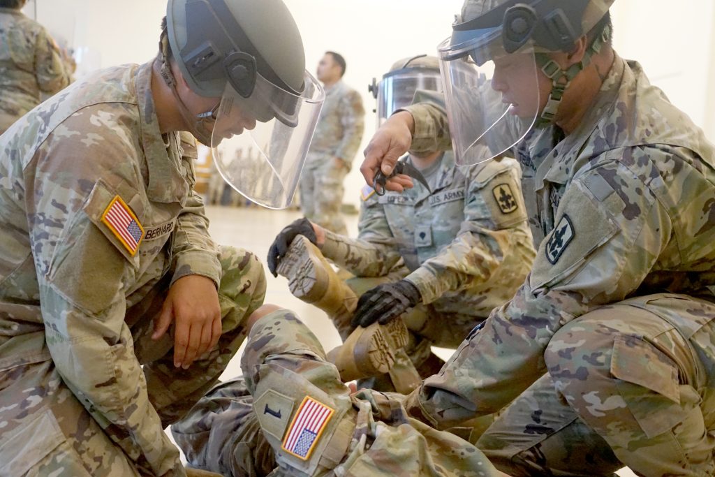 Soldiers with the Hawai’i National Guard conduct civil disturbance training at the 29th Readiness Center, Kalaeloa, Hawaiʻi, in March. The training, where soldiers acted as both protesters and responders, is part of an effort to meet updated federal guidelines for the National Guard Response Force, which focuses on de-escalation, site security and the protection of critical infrastructure. (U.S. Army National Guard photos by Rachel Blaire and retired Master Sgt. Andrew Jackson)