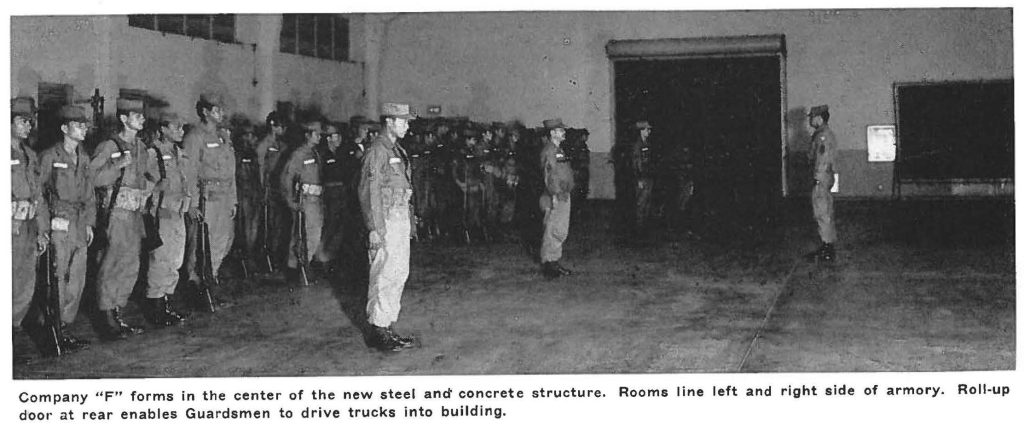 Company "F" forms in the center of the new steel and" concrete structure. Rooms line left and right side of armory. Roll-up door at rear enables Guardsmen to drive trucks into building.