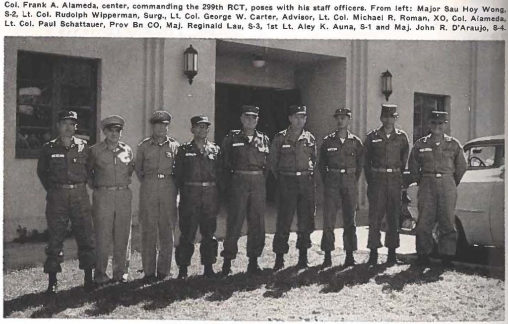Col. Frank A. Alameda, center, commanding the 299th RCT, poses with his staff officers. From left: Major Sau Hoy Wong, S-2, Lt. Col. Rudolph Wipperman, Surg., Lt. Col. George W. Carter, Advisor, Lt. Col. Michael R. Roman, XO, Col. Alameda, Lt. Col. Paul Schattauer, Prov Bn CO, Maj. Reginald Lau, S-3, 1st Lt. Aley K. Auna, S-1 and Maj. John R. D'Araujo, S-4.