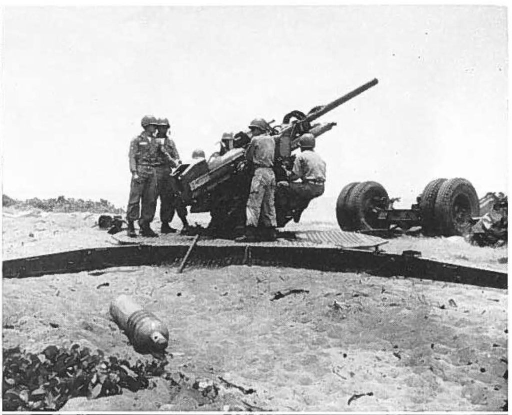 90 MM AA gun in full recoil at Dillingham AFB.