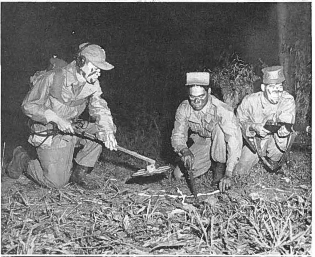 227th Engrs probe for mines.
