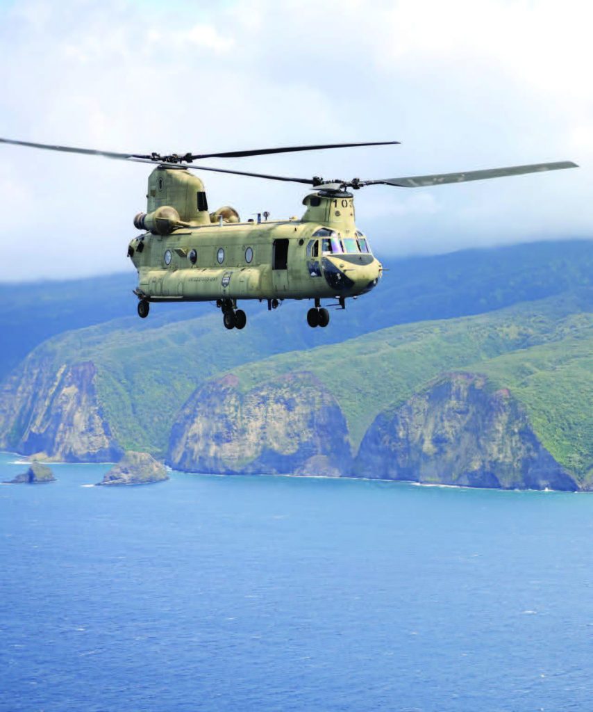 Soldiers assigned from Company B, 2nd Battalion, 2-11th Aviation Regiment, 103rd Troop Command, conducted multi-ship training exercises at Pōhakuloa Training Area on the Big Island in June 2025. A CH-47 Chinook helicopter flew off the islandʻs coast. – Hawai‘i National Guard photo by Spc. Jeremy Forella