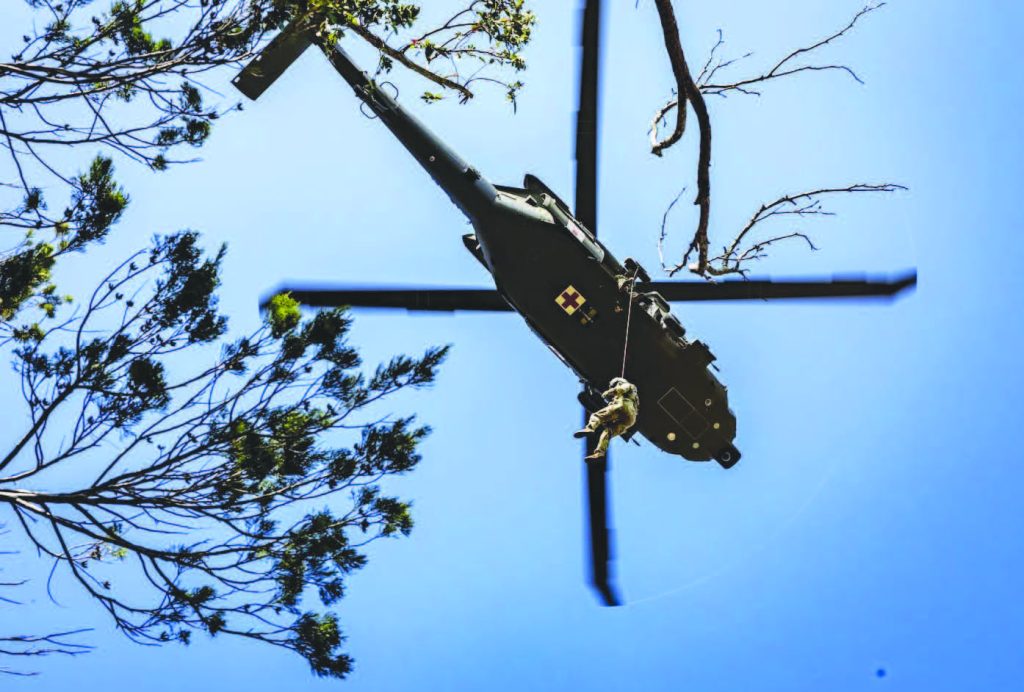 Hawai‘i Army National Guard HH-50 Black Hawk pilots and crew chiefs participated with the 25th Infantry Division in their Jungle Medicine course in January 2025. At the end of the field training exercise, participants administered proper combat lifesaving skills. – Hawai‘i National Guard photos by Staff Sgt. Lianne Hirano