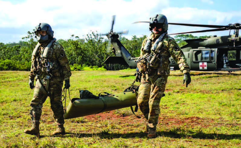 Hawai‘i Army National Guard HH-50 Black Hawk pilots and crew chiefs participated with the 25th Infantry Division in their Jungle Medicine course in January 2025. At the end of the field training exercise, participants administered proper combat lifesaving skills. – Hawai‘i National Guard photos by Staff Sgt. Lianne Hirano
