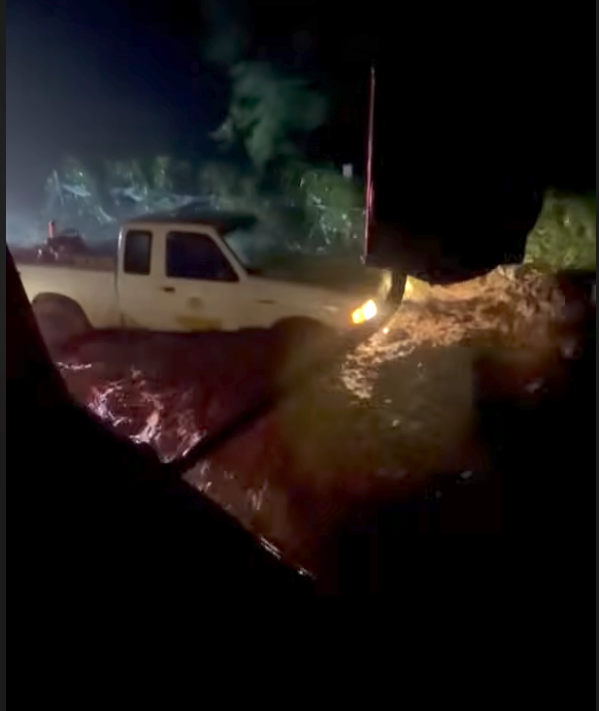 The Hawai‘i National Guardʻs Task Force Hawaiʻi responded to a dangerous high-water crossing to rescue two paramedics whose county truck became stranded by rapidly rising water in Nāʻālehu on the Big Island on Aug. 15. Watch the video at www.shorturl.at/eJBh5 (Hawai‘i National Guard video footage)