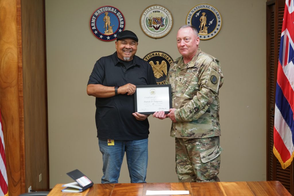 Tangonan received his certificate of recognition from Adjutant General Maj. Gen. Stephen Logan. (Photos by Ruben Duldulao)